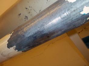 Leaking main water pipe creating a slip hazard