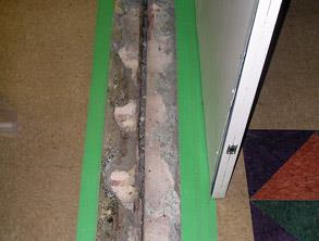 Damaged expansion joint causing a trip hazard in a hospital