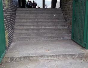 Deteriorated concrete step treads at a school