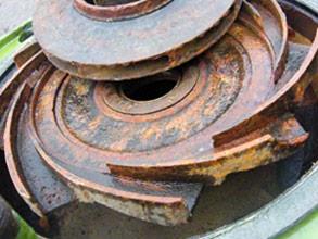Traces of cavitation and corrosion damage on pump