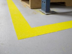 Safety Marking with Belzona 5231 (base coat), OSHA safety yellow aggregate, Belzona 5233 Clear (as a top coat)