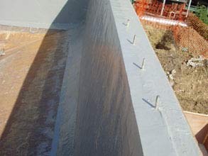 Concrete restored and tank protected against future damage using Belzona 5811 (Immersion Grade)